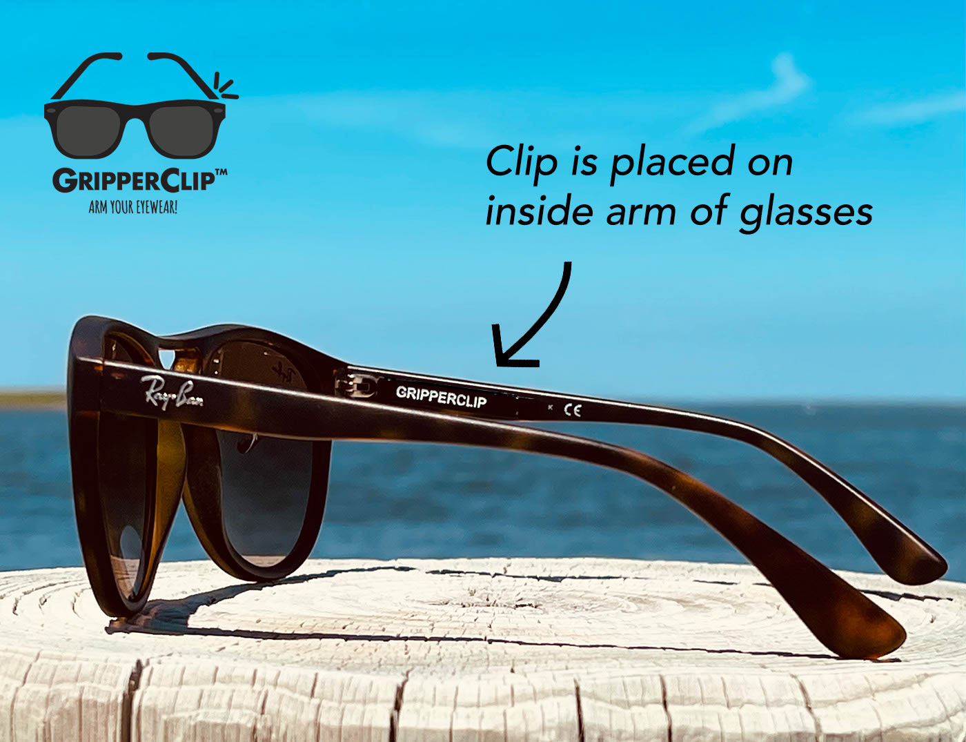 Rayban sunglasses with GripperClip installed showing how clip is placed on inside arm of glasses.